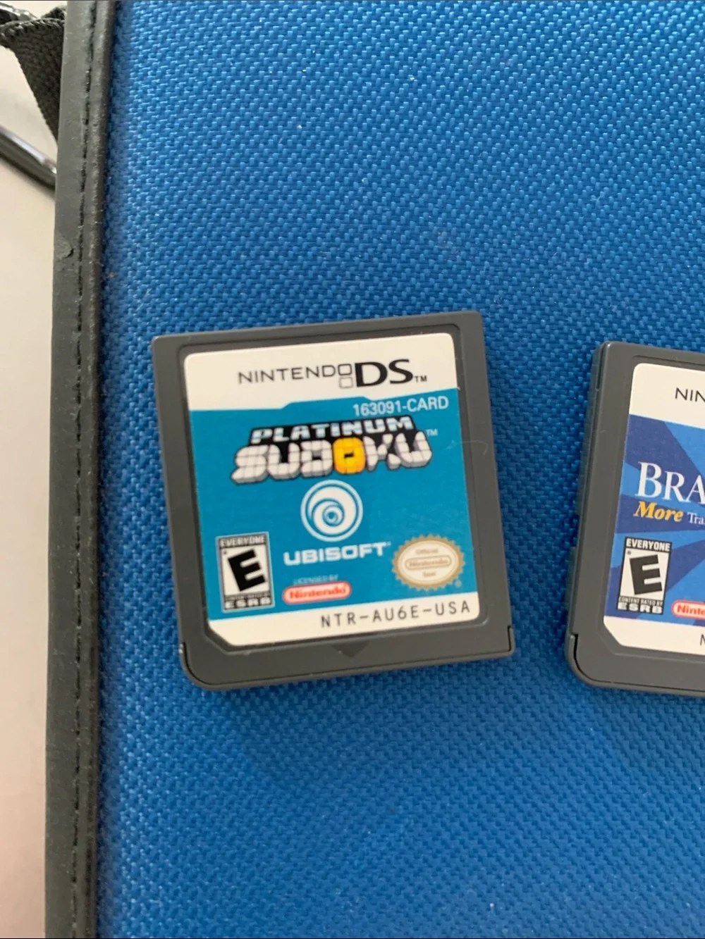 Vintage Nintendo DS case with two games - brain age 2 & platinum sudoku
